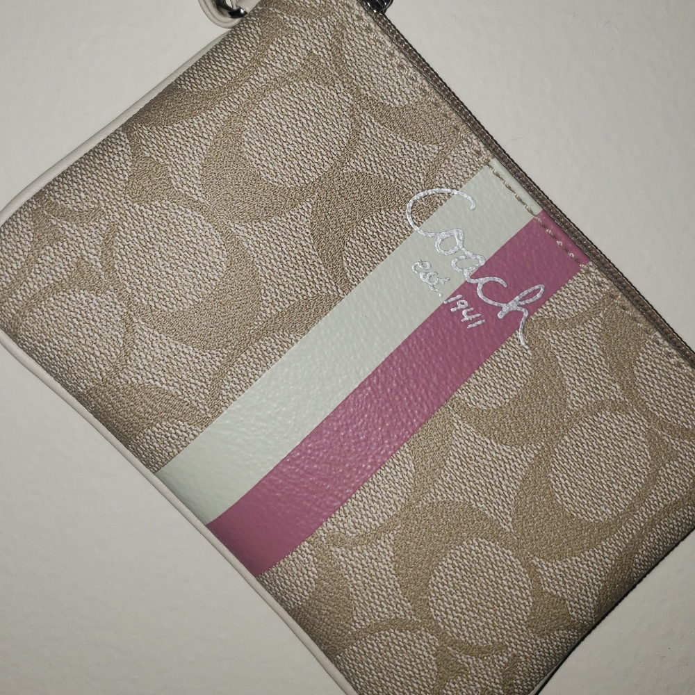 Coach wristlet tan and pink